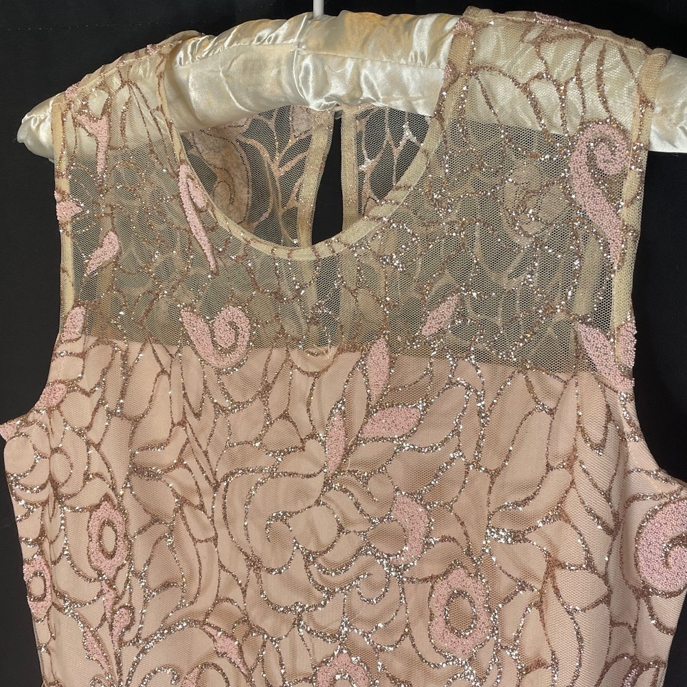 Rare Editions girl’s gold and pink wedding dress.